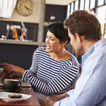 Man and woman meeting over coffee in a restaurant