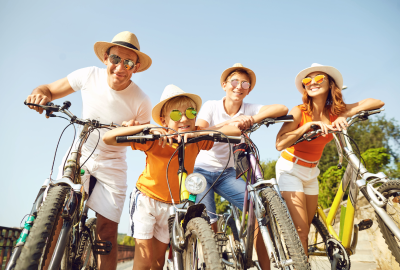 Summer parents family outside biking mother father son daughter exercise Summer parents family outside biking mother father son daughter exercise