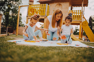 Young mother and daughter having fun time